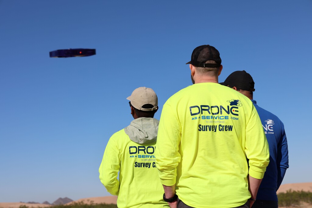 Members of ZenaTech's Drone as a Service team in the field